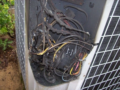 A burnt electrical component of an HVAC system